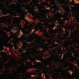 A detailed close-up image showcasing the rich texture of dried hibiscus flowers.